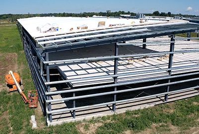 Concrete foundation exterior work for a steel building